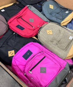 Wholesale pallet of assorted school backpacks in various colors and styles, ideal for retailers or bulk buyers