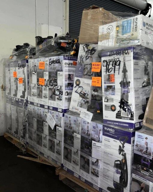Wholesale pallet of brand-new vacuum cleaners, including upright, canister, and handheld models – perfect for retailers and bulk buyers