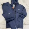 Wholesale pallet of brand-new mixed brand tracksuits in assorted colors, sizes, and styles – perfect for retailers and bulk buyers